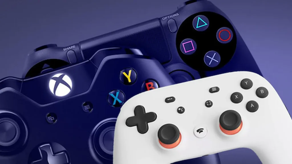 Mandos de Xbox, PlayStation y Stadia juntos exponiendo el lado oscuro de la industria del gaming.