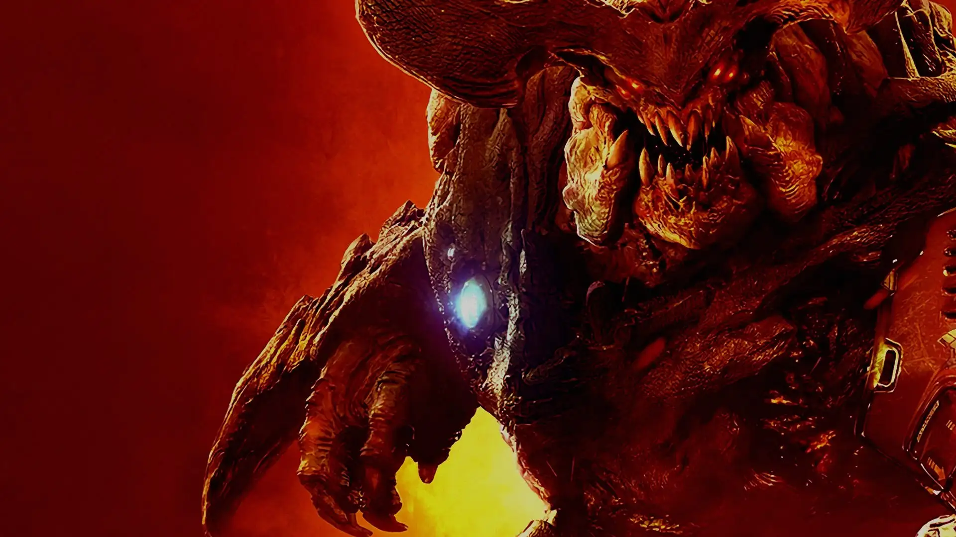 Un demonio colosal ruge entre fuego y sombras en la beta cerrada de Doom, mostrando su ferocidad con ojos rojos y colmillos afilados.