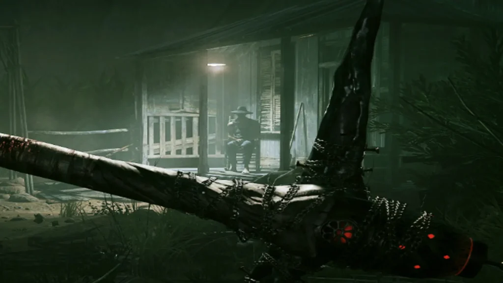 Pico ensangrentado apunta hacia una cabaña iluminada con una figura sentada en el porche.