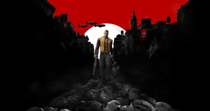El héroe de Wolfenstein II camina sobre un montón de cascos nazis hacia una ciudad oscurecida por una bandera roja gigante.