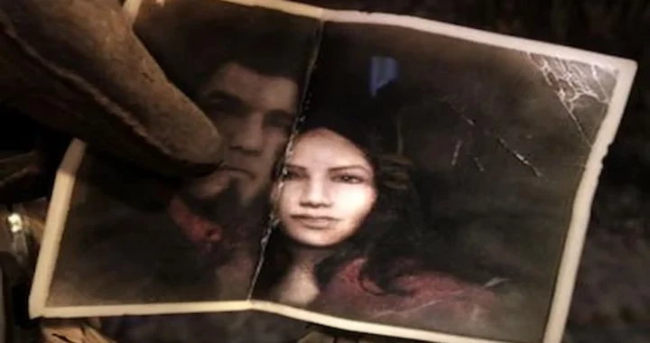 Dominic sostiene la foto de María en Gears of War, recuerdo doloroso ligado a romances en los videojuegos.