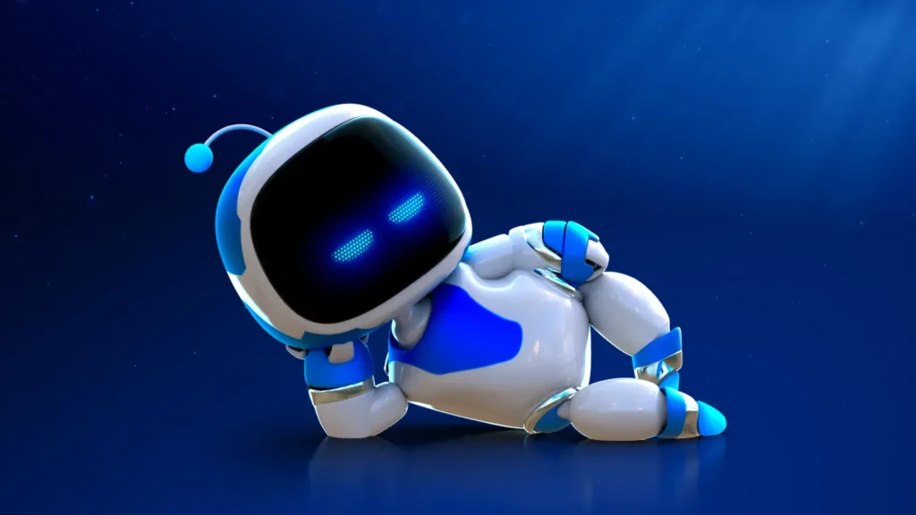 El trágico y glorioso mes de Sony. PlayStation, espabila y date cuenta 3 Un personaje del videojuego Astrobot de PlayStation 5, posando ante la cámara del jugador en un fondo azul y negro.