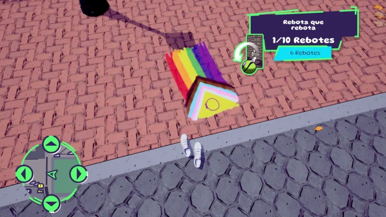 Unas zapatillas o bambas vistas desde arriba, en el centro hay una bandera lgtbi+ pintada en el suelo.