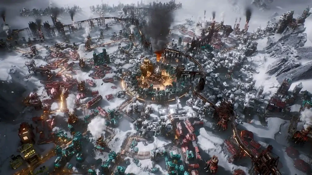 Vista aérea de la mega urbe industrial en Frostpunk 2, cubierta de nieve y con fábricas humeantes.