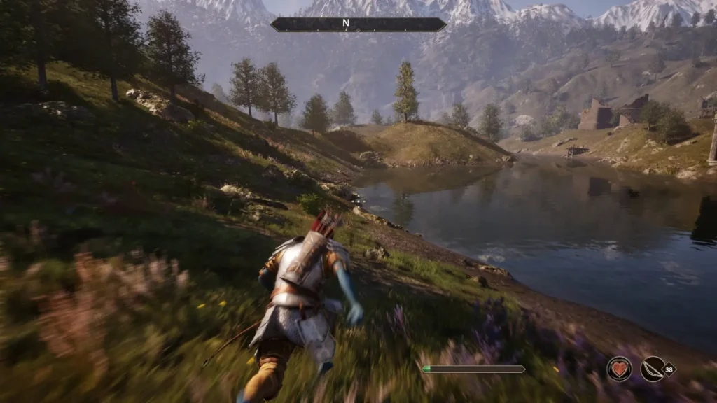 Personaje corre por un valle verde hacia un lago con montañas nevadas al fondo en The Elder Scrolls IV: Oblivion Remastered.