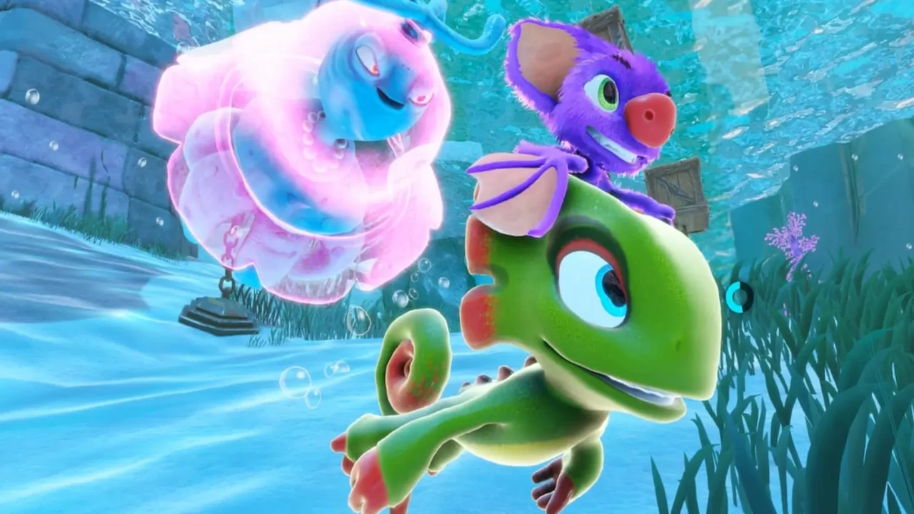 El personaje principal verde, Yooka-Replaylee, y su amiga murciélago púrpura Laylee están bajo el agua siguiendo a una criatura bioluminiscente rosa.