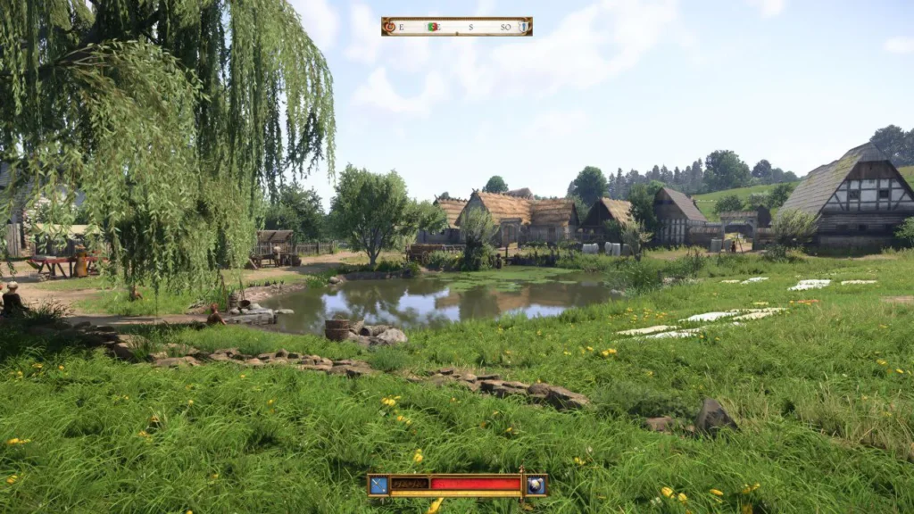Aldea medieval luminosa con lago y casas de madera vistas en primera persona, vida rural detallada en Kingdom Come: Deliverance II.