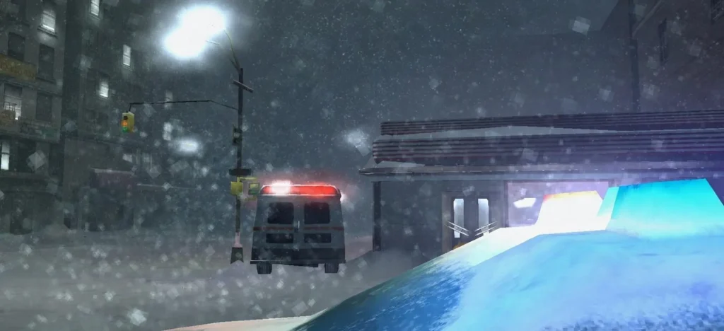 En Fahrenheit, una ambulancia con luces encendidas avanza bajo intensa nevada en una calle nocturna y desierta.