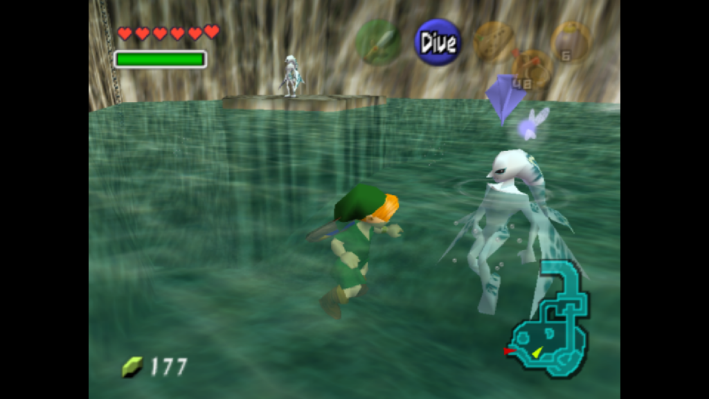 Link niño nadando en Ocarina of Time junto a un zora y un hada, con el botón Dive y el minimapa en pantalla