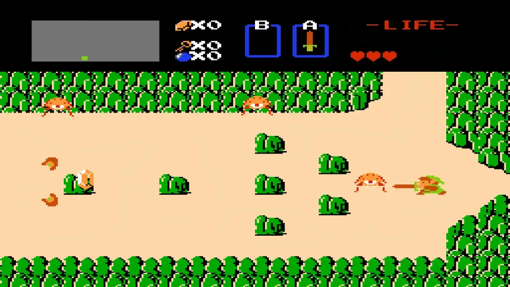 The Legend of Zelda de NES en vista cenital: Link ataca a un enemigo con el indicador de vida arriba